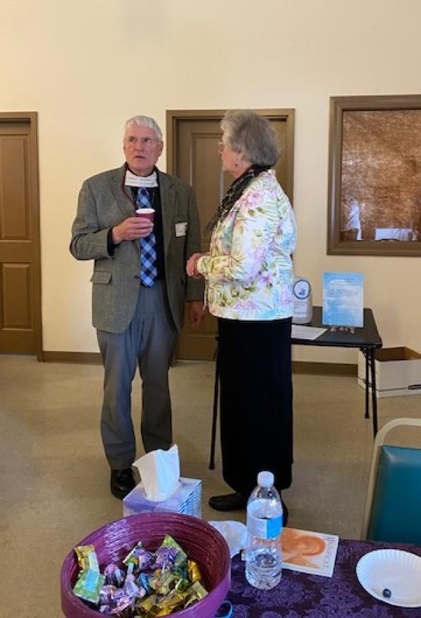 Deacon Schneider and Regent Schneider share a moment of reflection on how the retreat was going during one of the breaks.